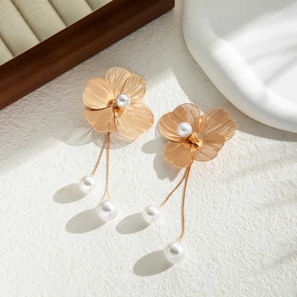 Long earrings with romantic flower petals