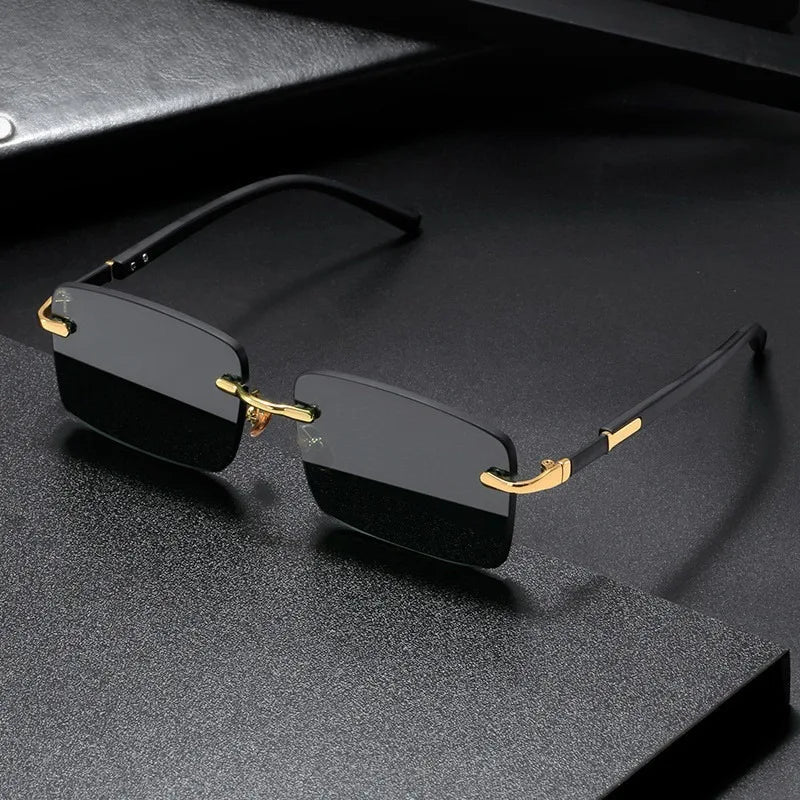 Rimless sunglasses with cut lenses