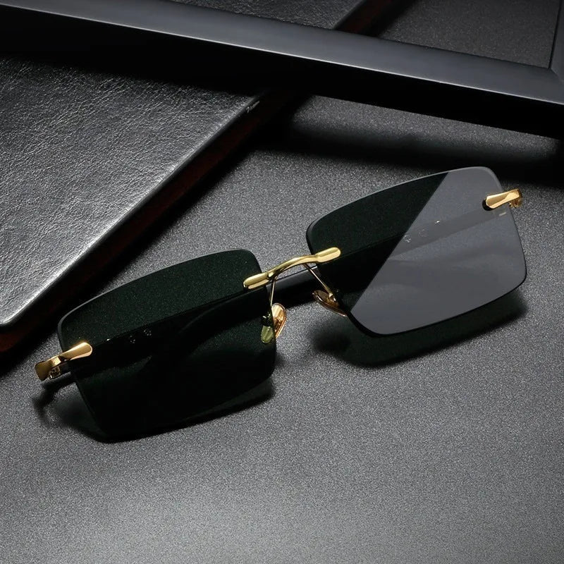 Rimless sunglasses with cut lenses