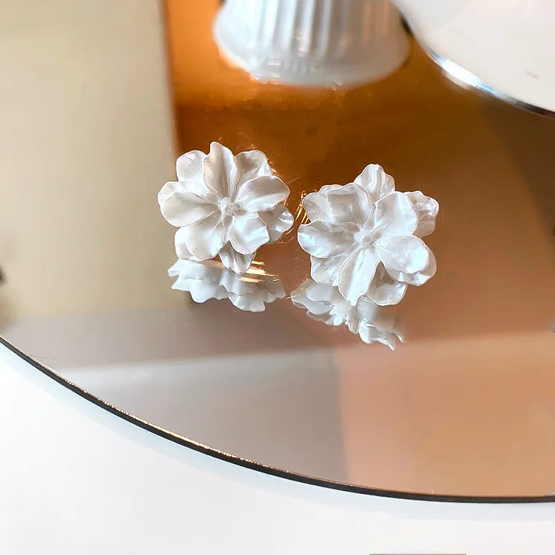 Acrylic earrings with white camellia flowers