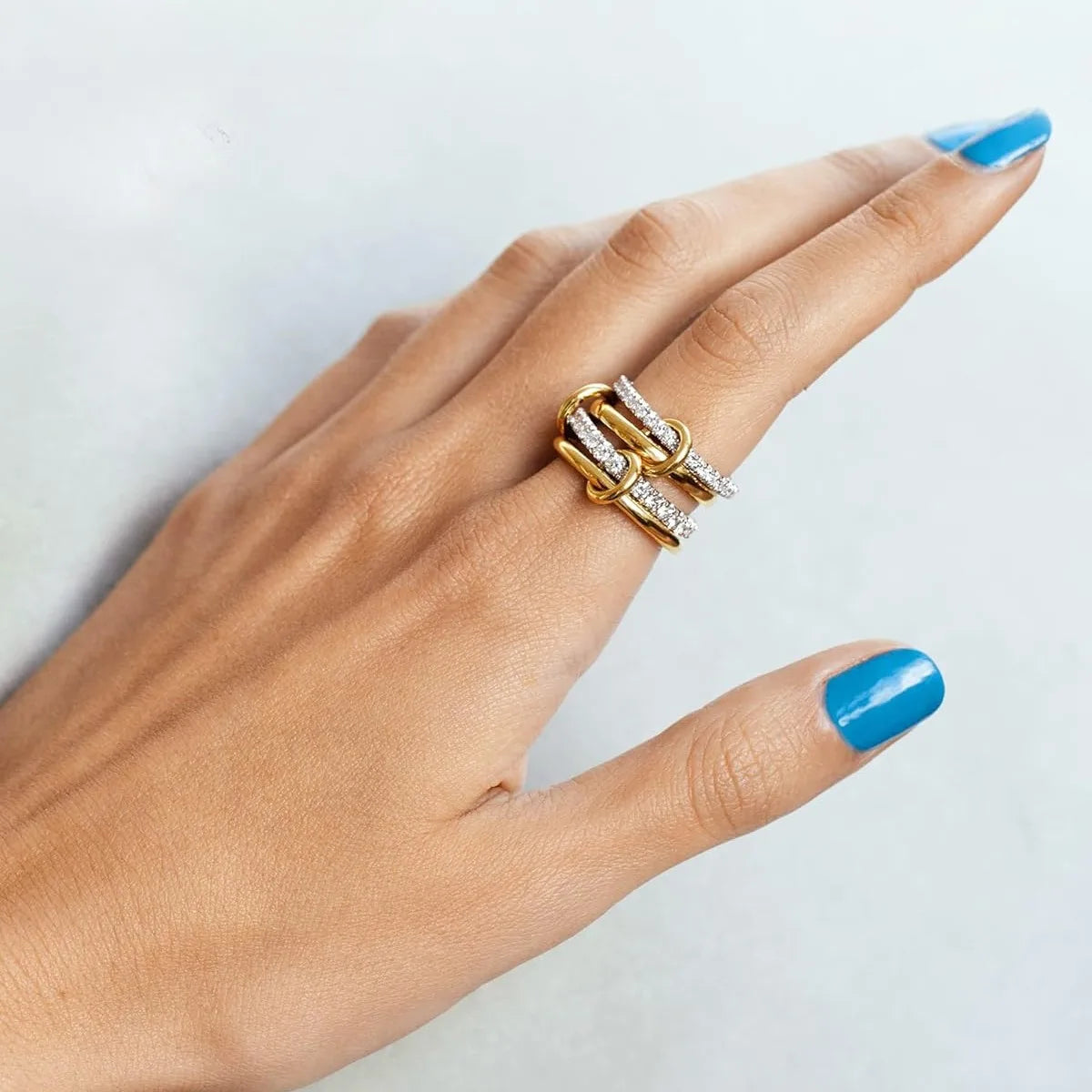 Ring with four two-tone hoops