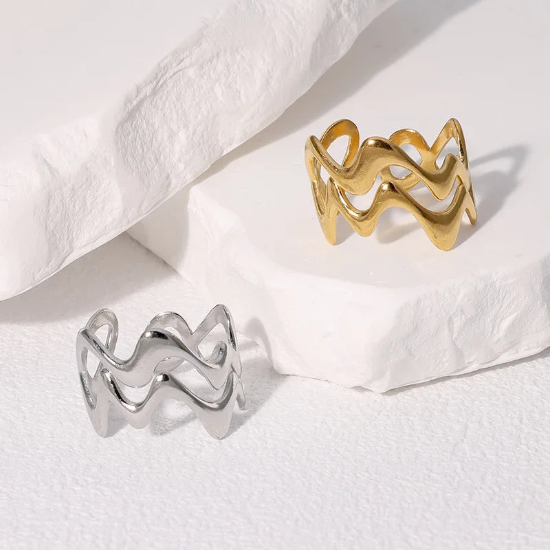 Stainless steel rings with irregular waves