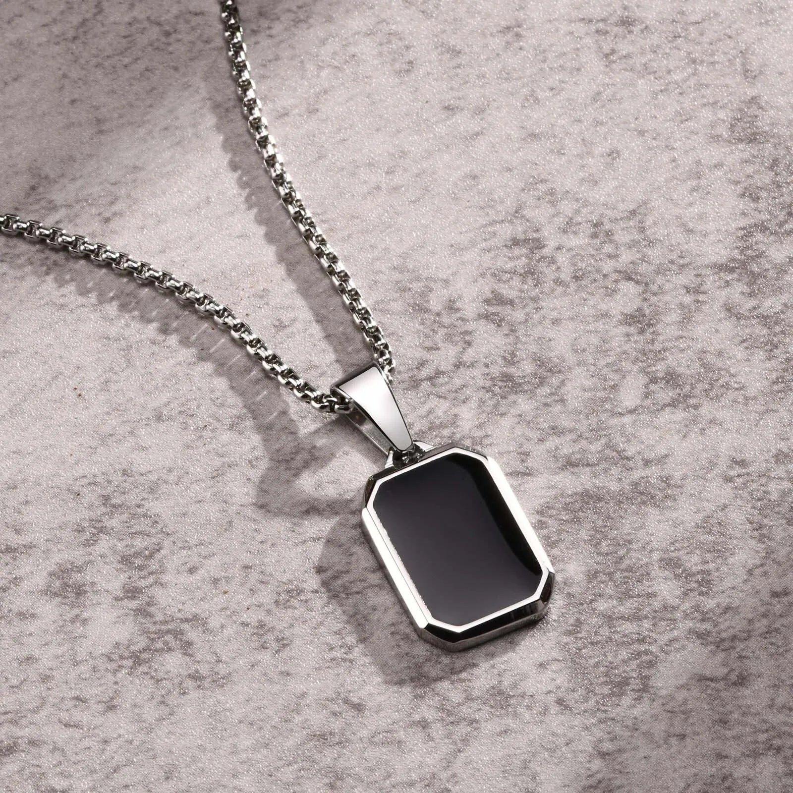 Necklaces with black stone pendants