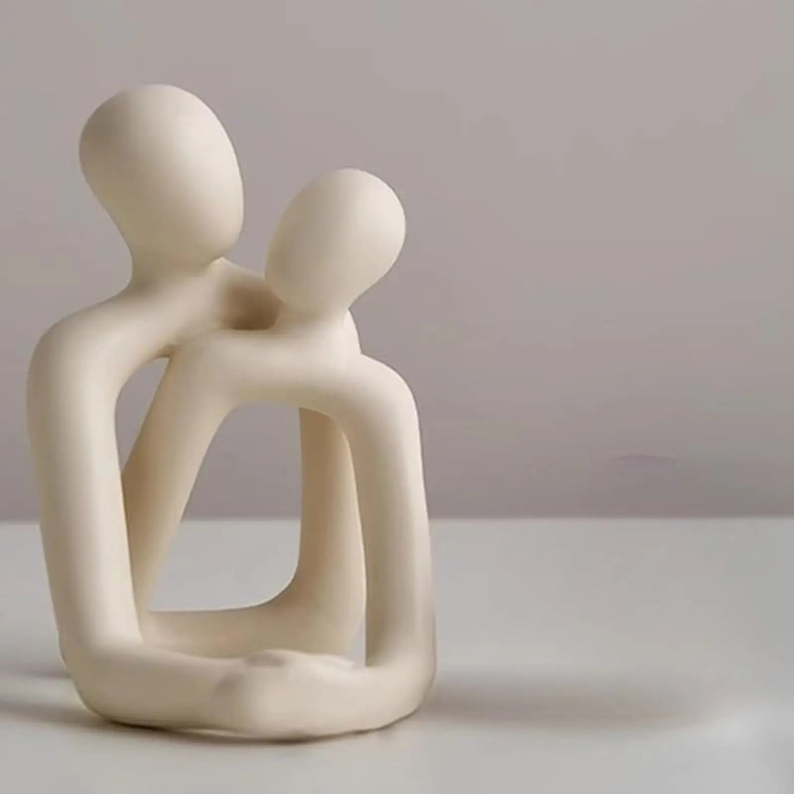 Resin statue of a couple in love
