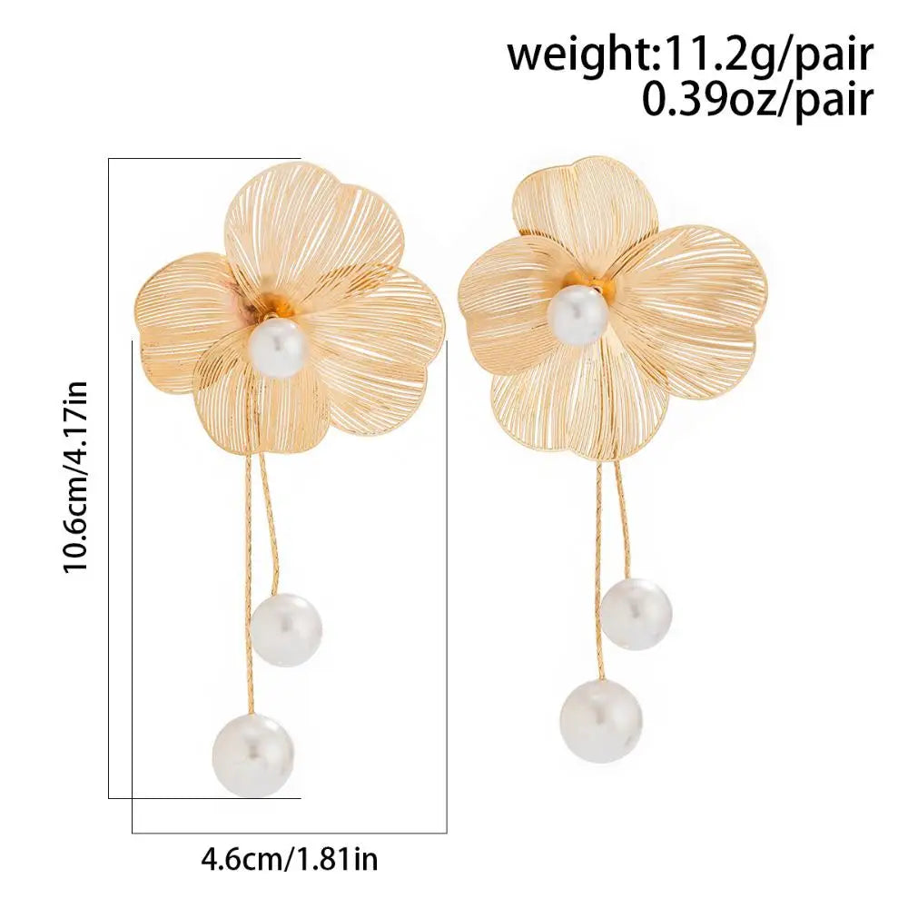 Long earrings with romantic flower petals