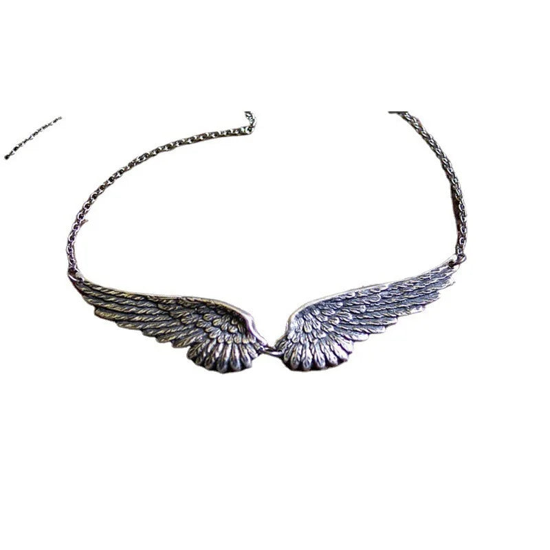 Necklace with angel wings and feathers