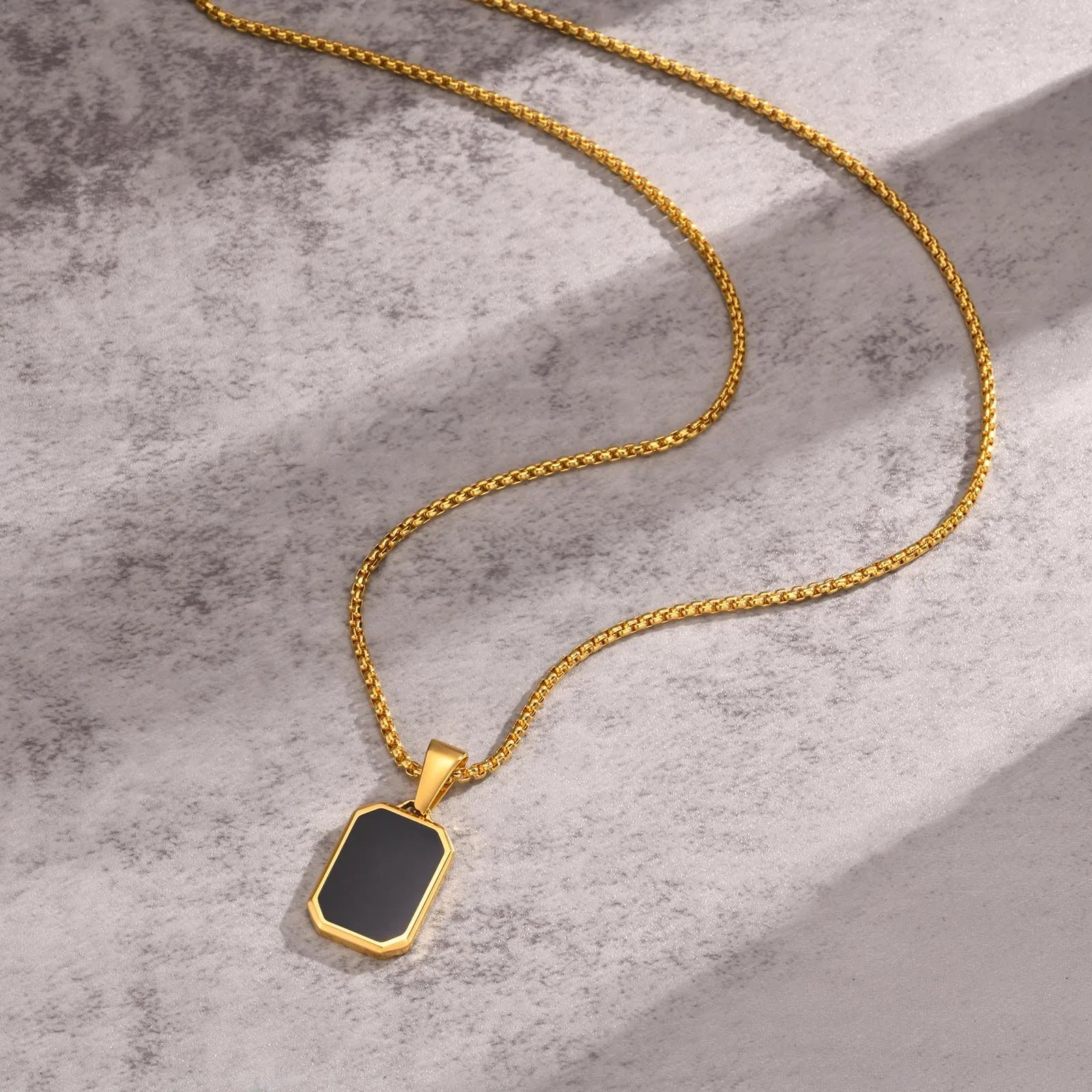 Necklaces with black stone pendants