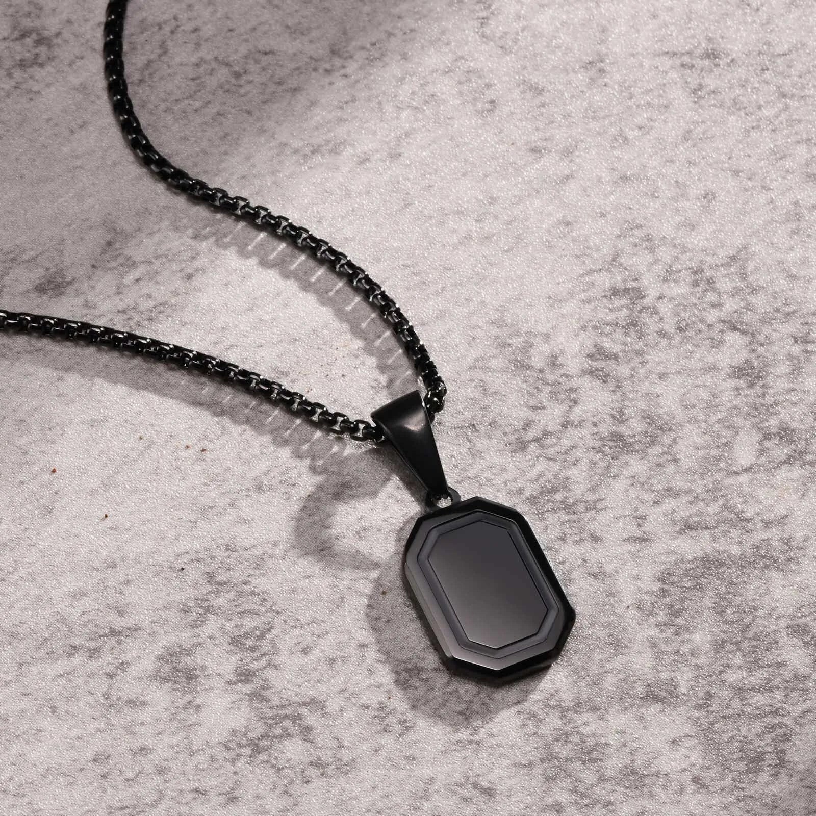 Necklaces with black stone pendants
