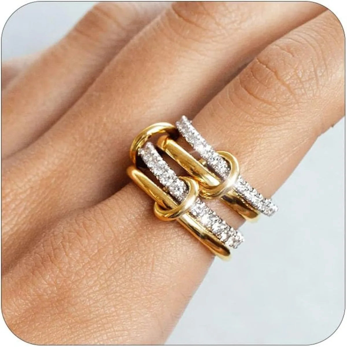 Ring with four two-tone hoops