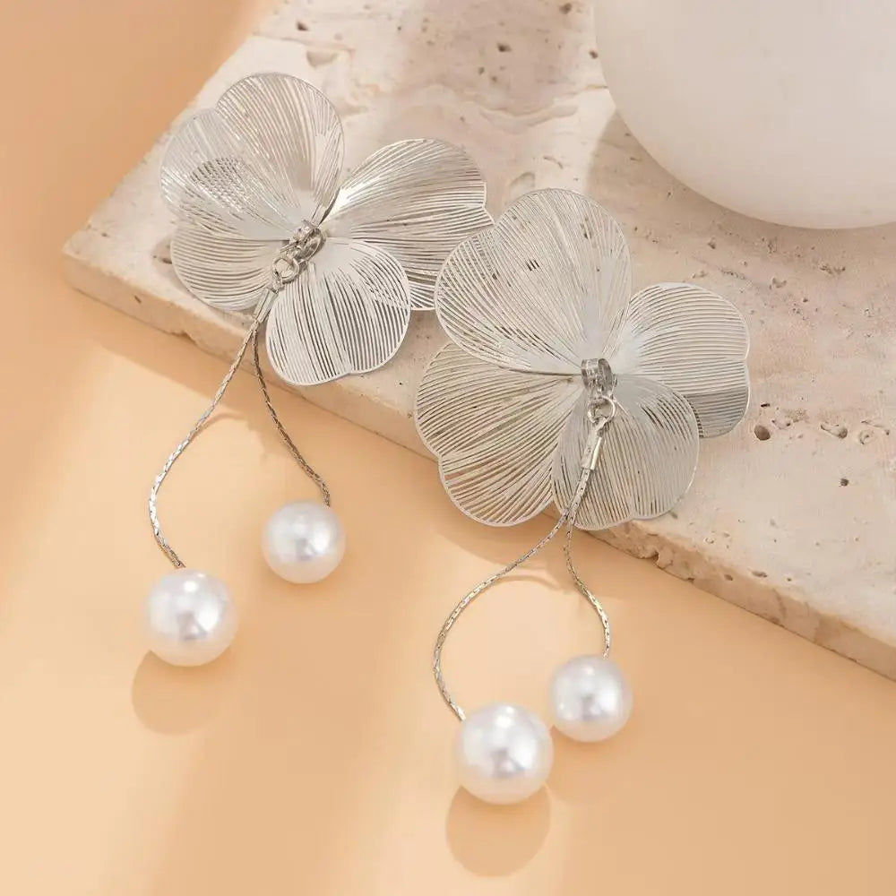 Long earrings with romantic flower petals