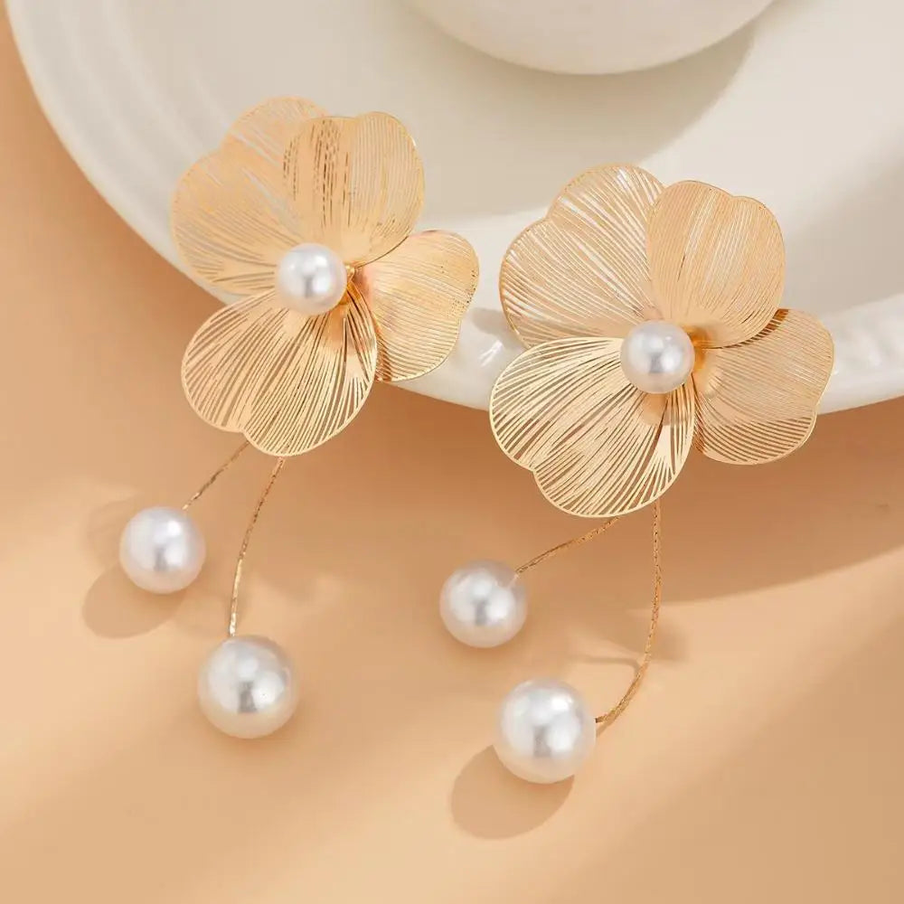 Long earrings with romantic flower petals