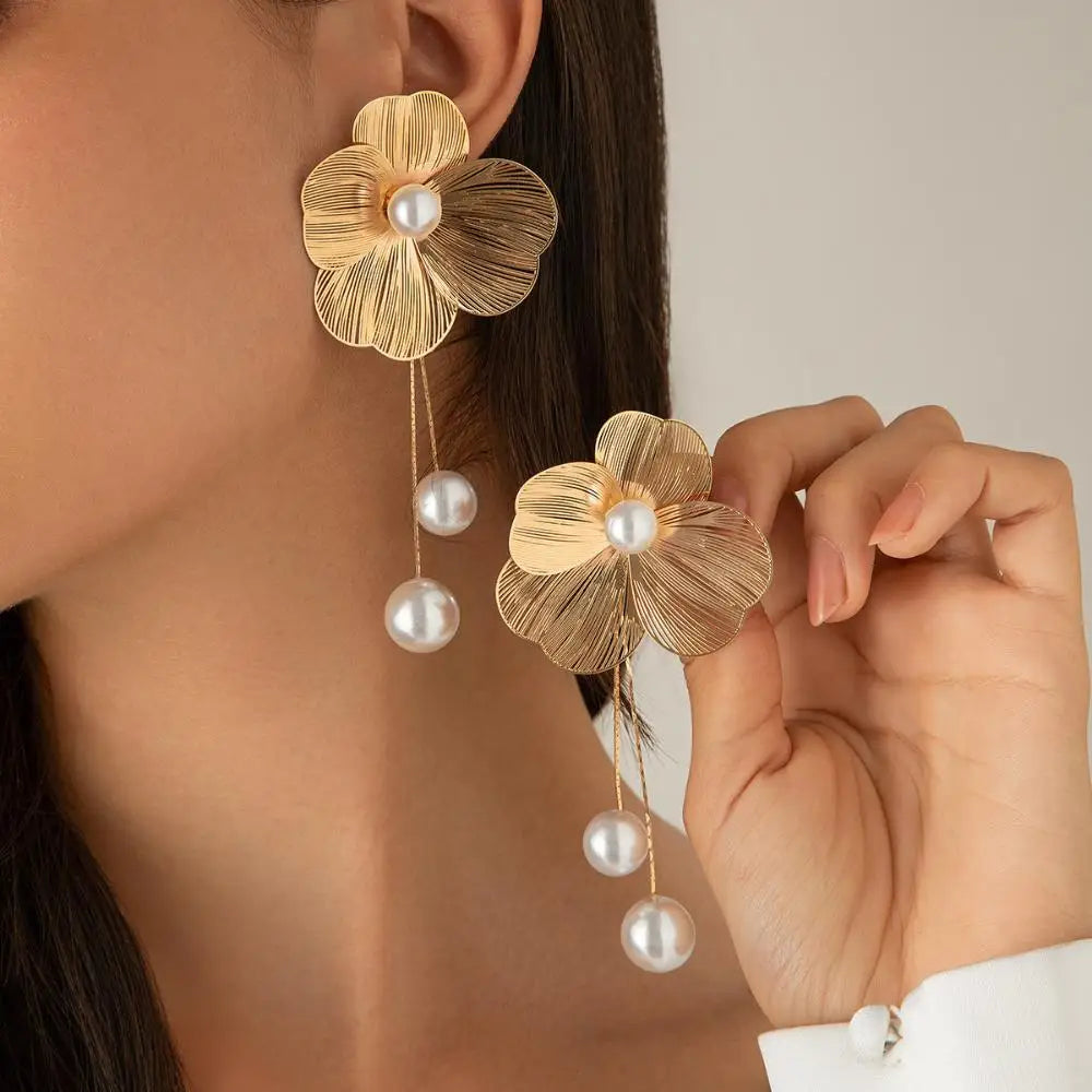 Long earrings with romantic flower petals