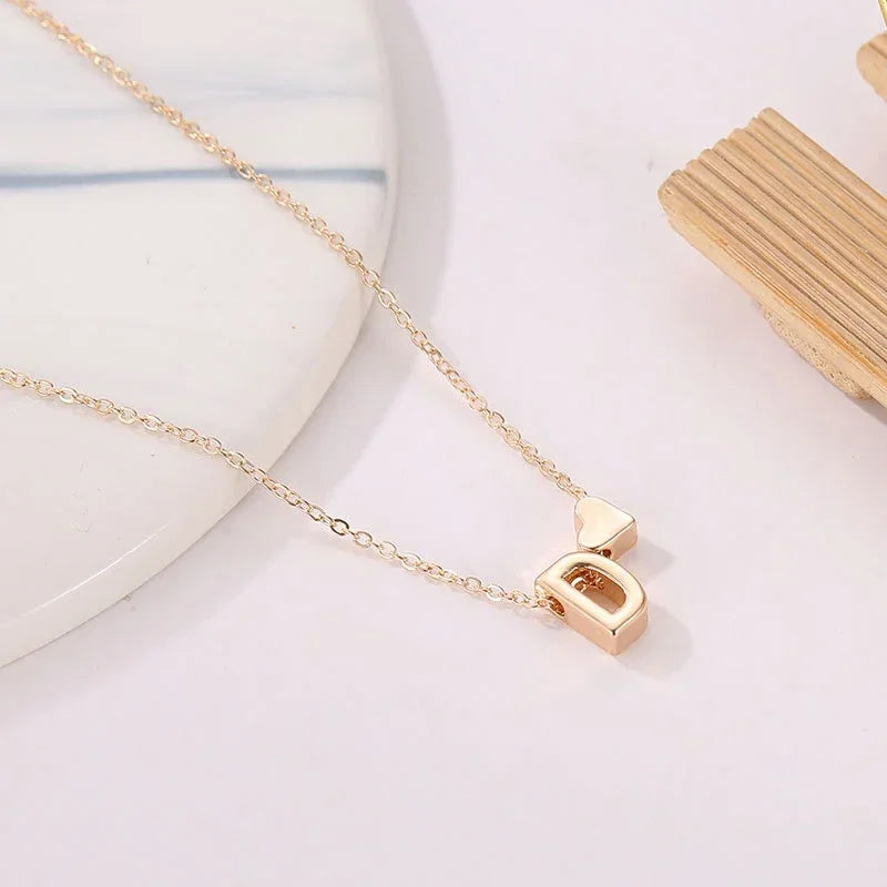Necklace with delicate heart-shaped initial pendant