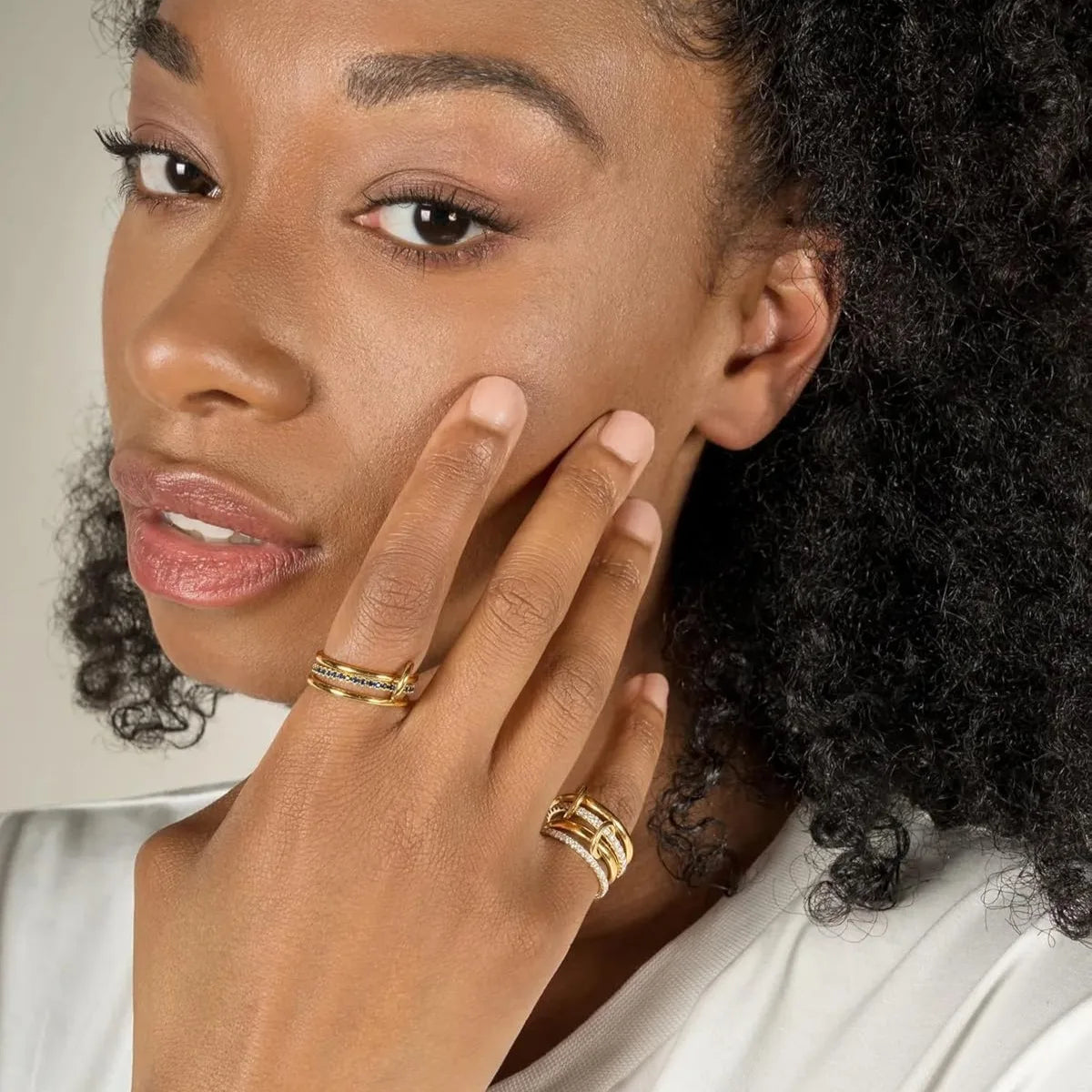 Ring with four two-tone hoops